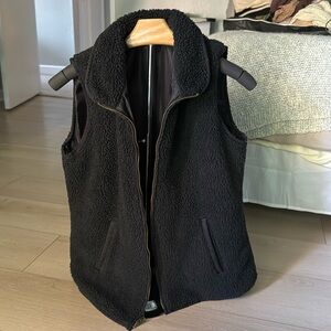 Black Sherpa vest with gold zipper